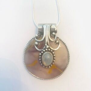 1 1/4 inch,, Classy Mookaite and Rainbow Moonstone pendant on a silver chain.